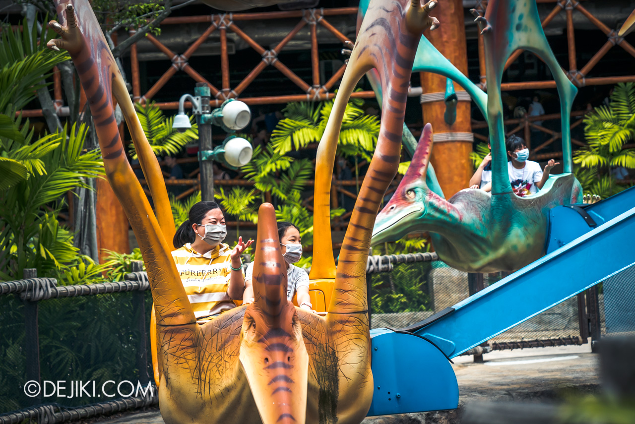 Universal Studios Singapore Park Update Feb 2020 guests wearing masks on rides Dino Soarin