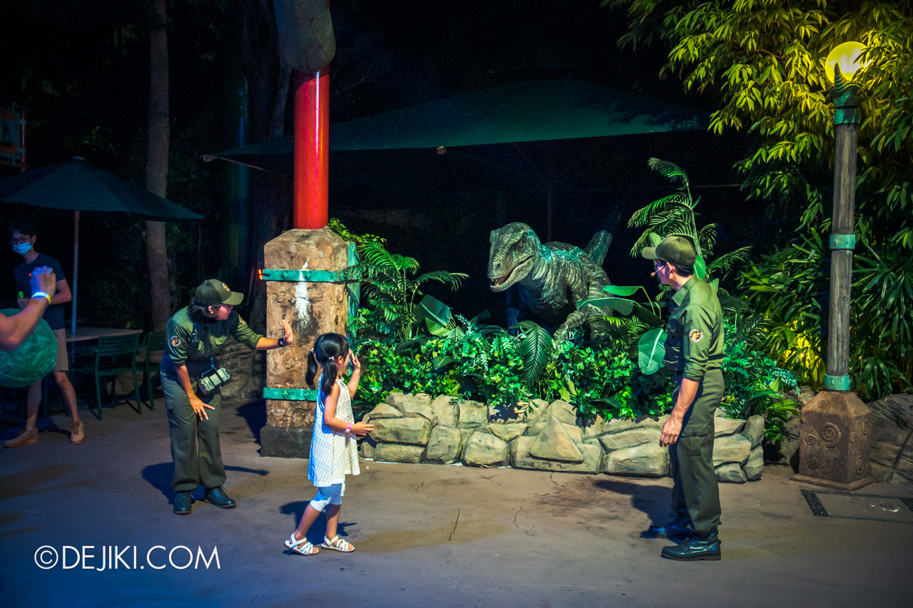 USS Jurassic World Dominion Dining Adventure 5 Final Meet and Greet Blue Velociraptor with guest