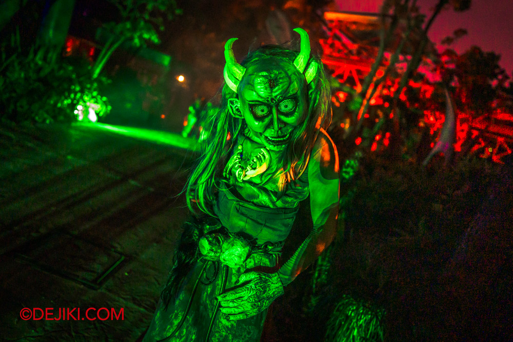 USS Halloween Horror Nights 11 Scare Zones Feature by Dejiki The Cursed Kiramam 8 green masked demon