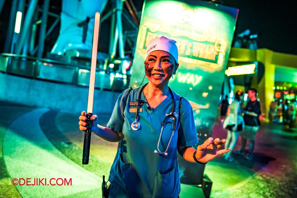 Universal Studios Singapore Halloween Horror Nights 11 RIP Tour Guide leading guests to Dead Mans Wharf scare zone