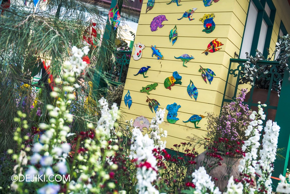 Gardens by the Bay Carnival of Flowers Australian Themed Floral Display 5 Main Field house with handpainted wooden ornaments