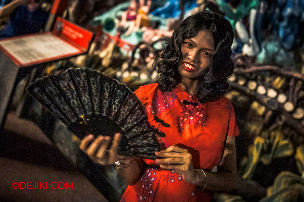 Haw Ror Villa 3 Halloween event at Haw Par Villa Singapore 2024 The Villa Has Eyes Interactive Ghostly Guided Tour Evidence Candy Mistress closeup