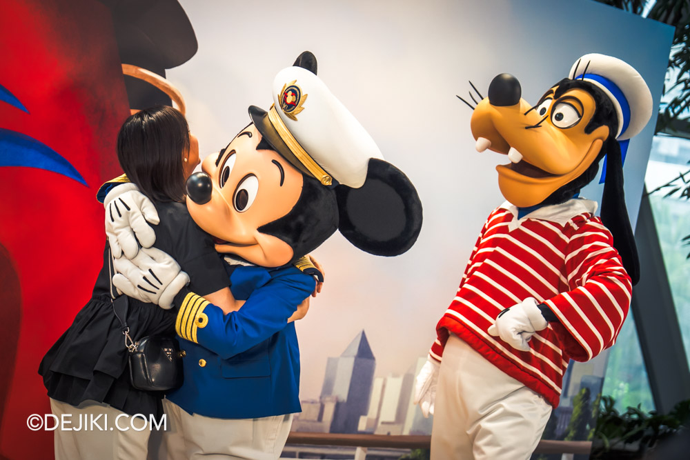 Disney Cruise Line event at Changi Airport Meet and Greet with Captain Mickey and Goofy Interaction with Guest Hugging