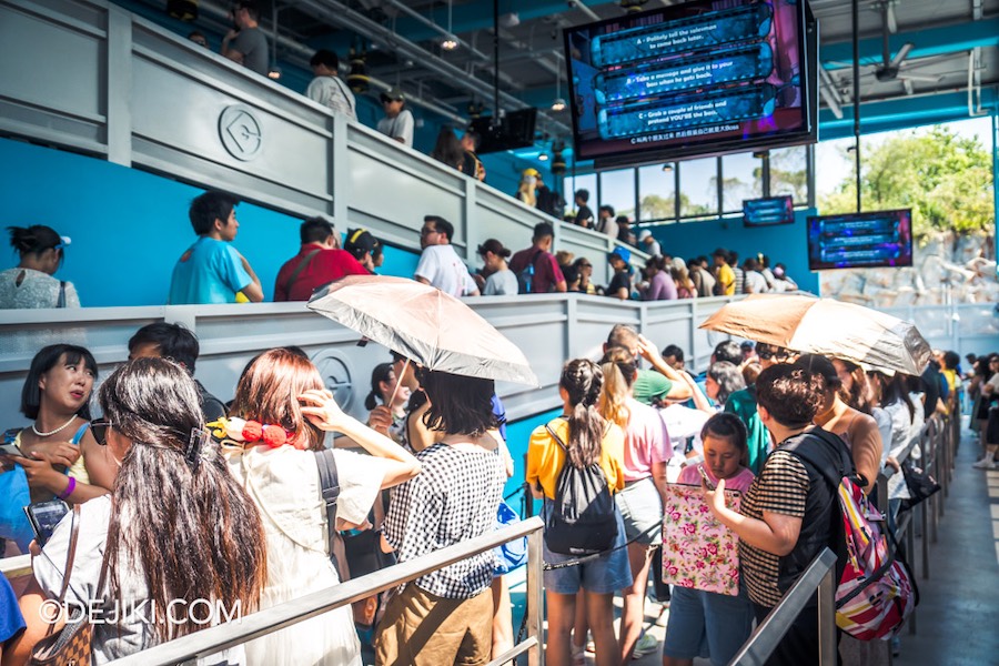 Universal Studios Singapore Minion Land Rides Despicable Me Minion Mayhem main queue area and ramp with crowds