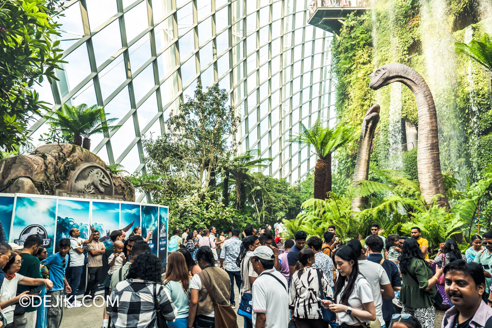 Gardens by the Bay Cloud Forest featuring Jurassic World The Experience sneak peek Brachiosaurus Falls wide with crowds