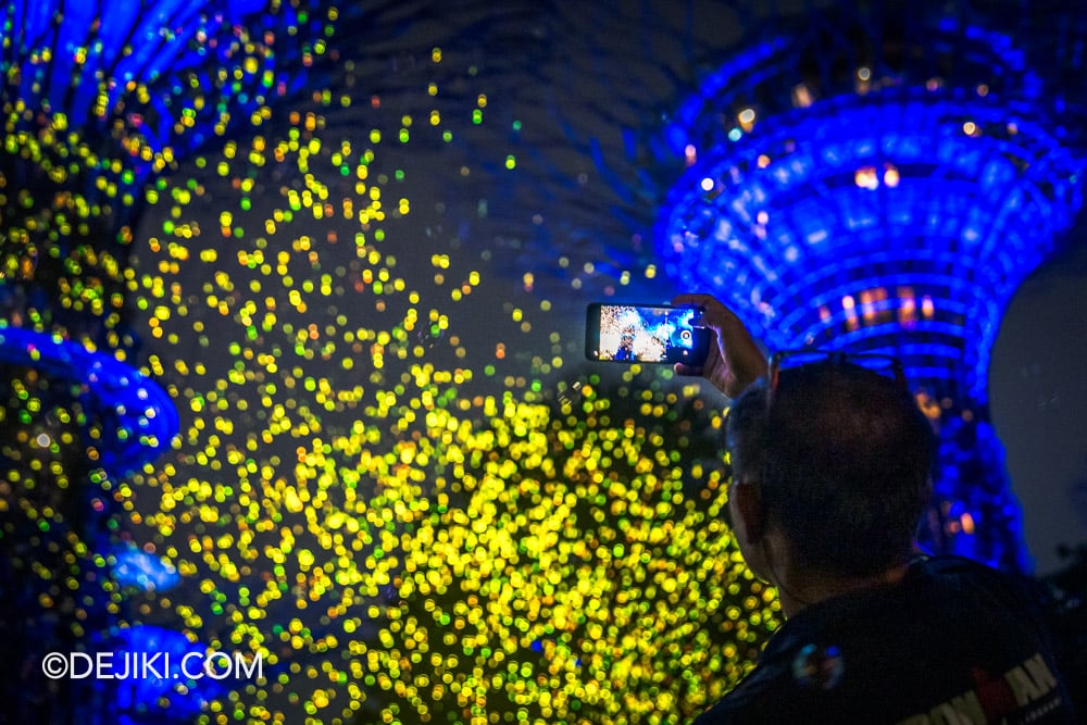 Southeast Asian debut of SPARK at Gardens by the Bay Singapore Visitor Closeup with Yellow Light Sparks