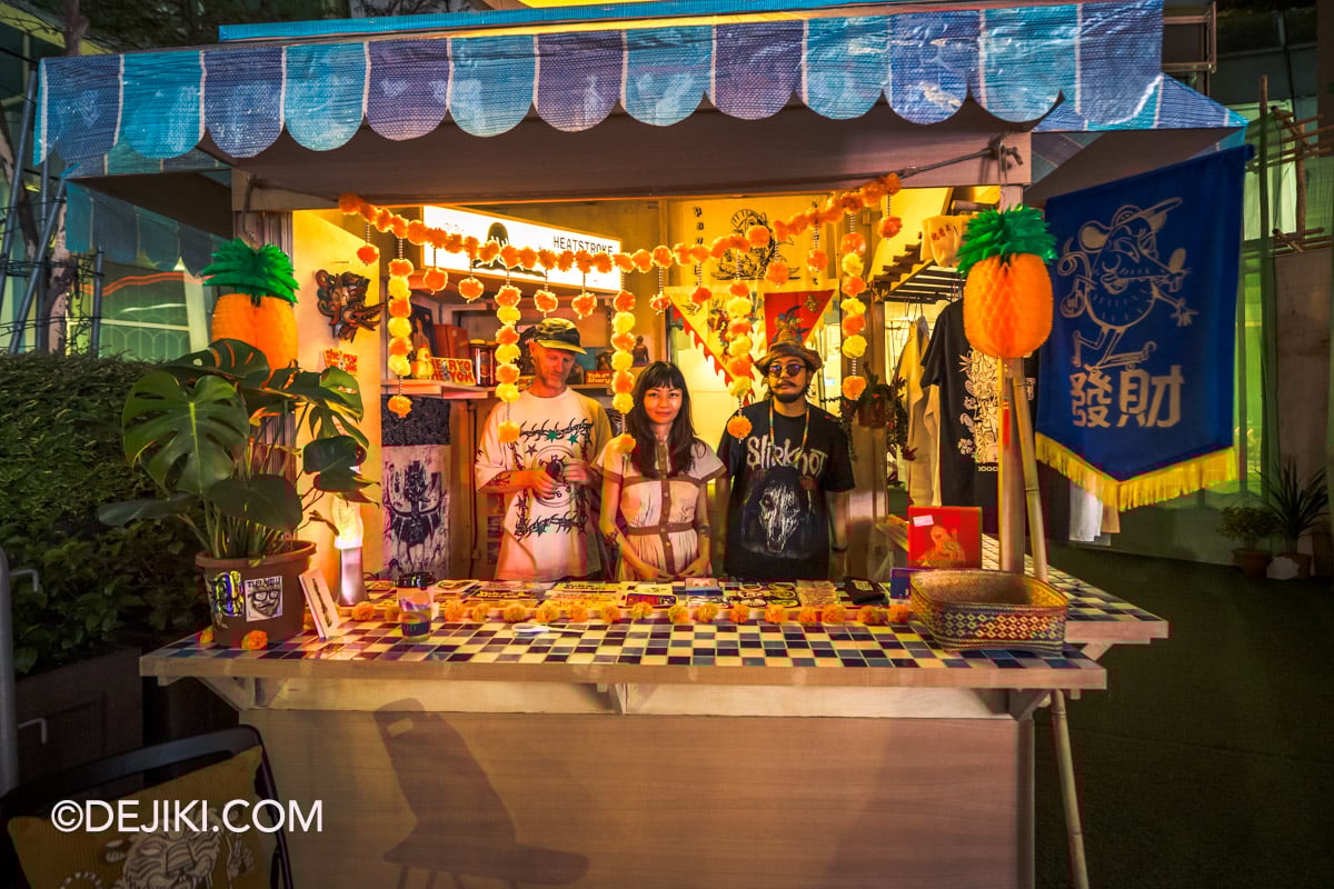Singapore Night Festival 2025 Highlight Experience Kampong Chill Heatstroke Hotel merch stand with artist Yok and Sheryo