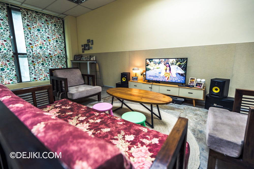 Singapore Biennale 2025 Photo Tour - Lucky Plaza - The Filipino Superwoman x HOME Karaoke Living Room by Eisa Jocson sofa and table Singapore Biennale 2025 Photo Tour Lucky Plaza The Filipino Superwoman x HOME Karaoke Living Room by Eisa Jocson sofa and table