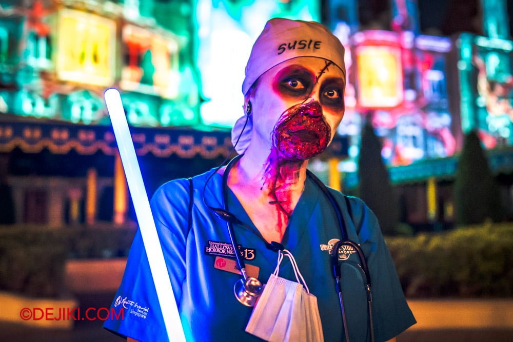 Universal Studios Singapore Halloween Horror Nights 13 USS HHN13 RIP Tour RIP Guide in front of Far Far Away castle