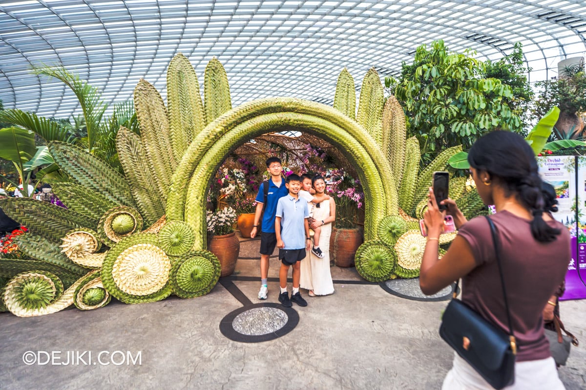 Gardens by the Bay - Orchid Extravaganza 2026 Rhythm of the Rainforest - Anyaman Sculpture Entrance Gate Guests Taking Group Photo Gardens by the Bay Orchid Extravaganza 2026 Rhythm of the Rainforest Anyaman Sculpture Entrance Gate Guests Taking Group Photo
