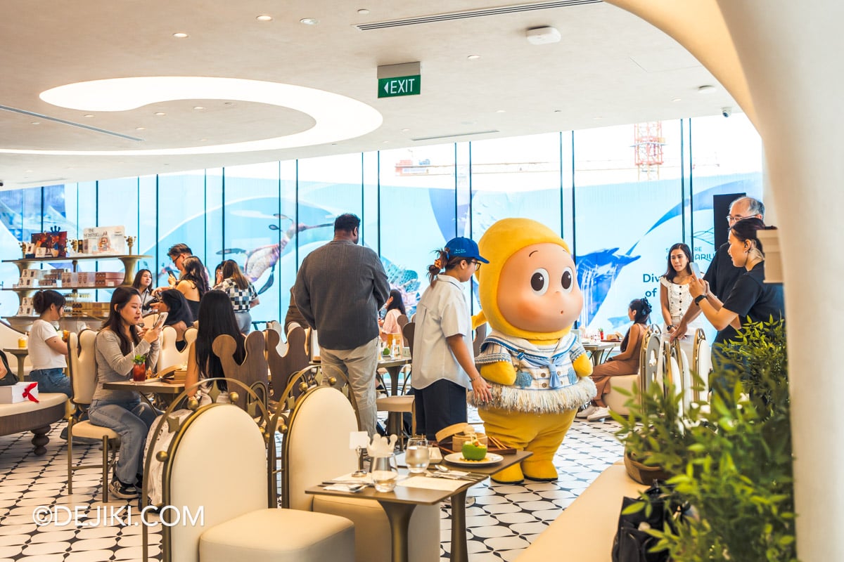 POP BAKERY Singapore at Resorts World Sentosa - Cafe Activity with Twinkle Twinkle going around tables Twinkle Twinkle mascot moving between tables during a Meet and Greet session at POP BAKERY, Resorts World Sentosa
