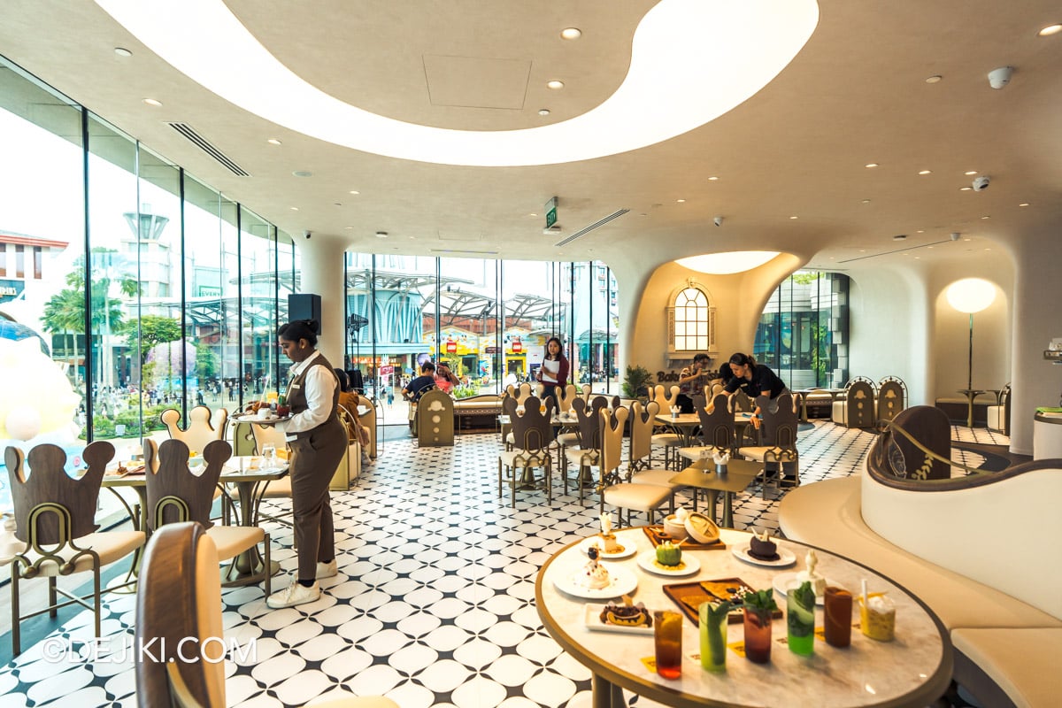 POP BAKERY Singapore at Resorts World Sentosa - Cafe Design Dining Area with Peranakan Floor Tiles POP BAKERY dining area with black and white Peranakan floor tiles and sculpted plaster ceiling forms