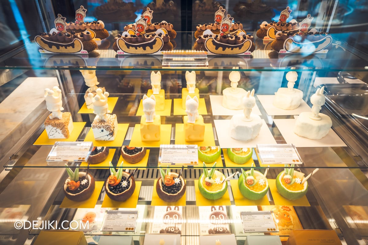POP BAKERY Singapore at Resorts World Sentosa - Cafe Retail Section with Cakes and Desserts for Takeaway Takeaway counter at POP BAKERY with cakes and desserts on display