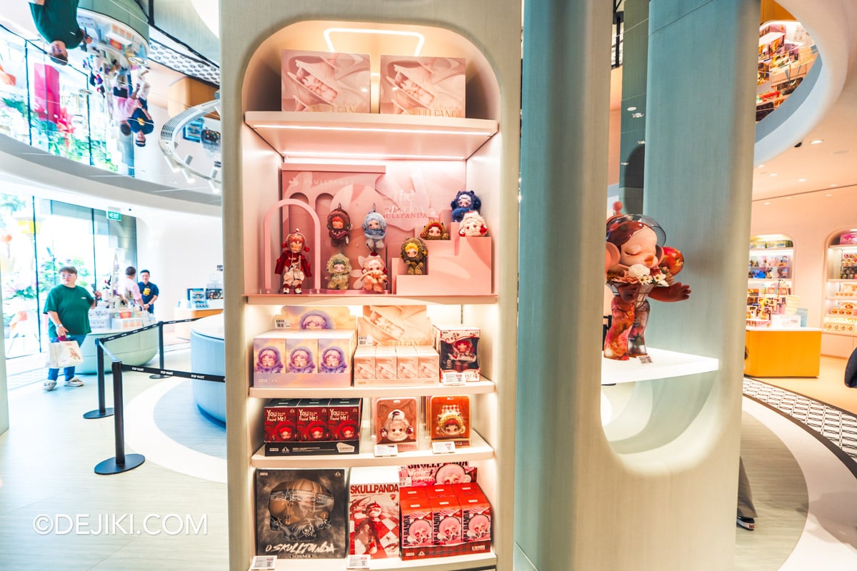 POP MART Resorts World Sentosa - 14 wide shot of skullpanda shelf Wide view of the SKULLPANDA shelf display at POP MART Resorts World Sentosa