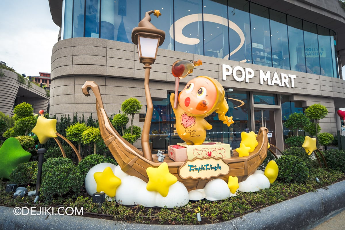 POP MART Store at Resorts World Sentosa - Twinkle Twinkle sculpture on boat Twinkle Twinkle sculpture on a crescent boat at the entrance to POP MART, Resorts World Sentosa